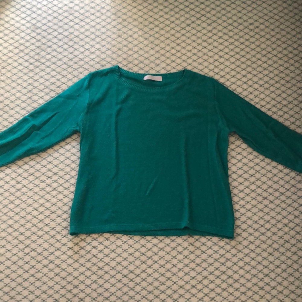 Well worn teal sweater